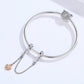 Snake-chain bracelet with plated safety chain and small clover charm pendant