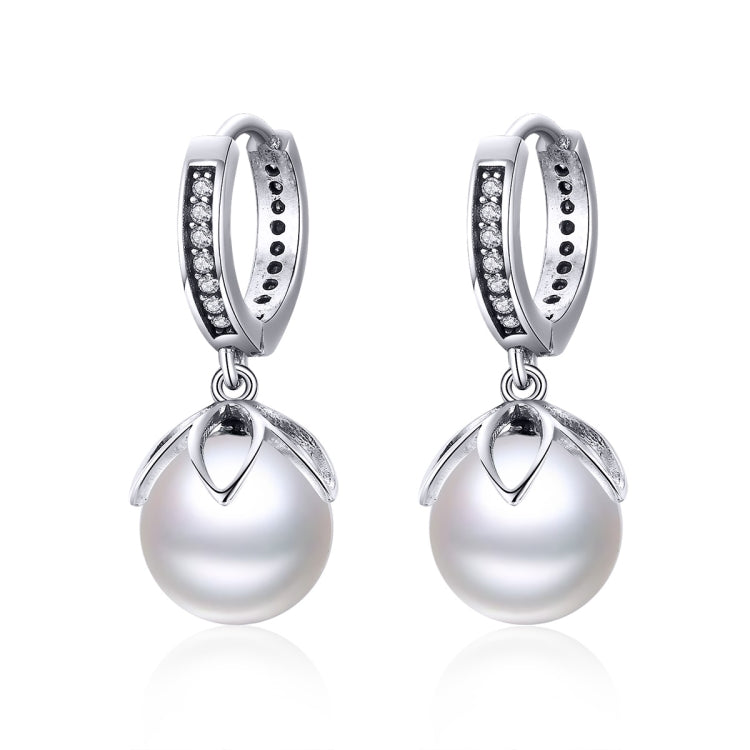 Silver hoop earrings with round shell bead drops and clear stones