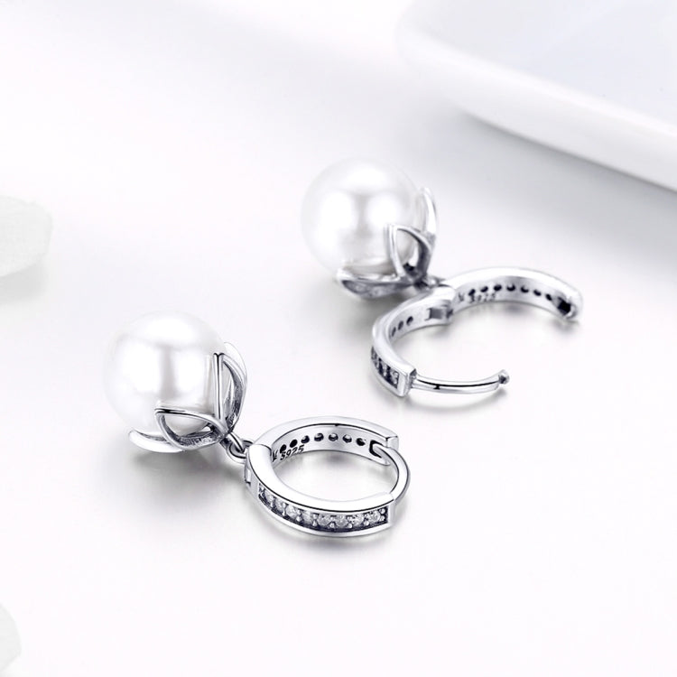 Silver hoop earrings with round shell bead and pavé accents