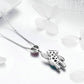 Sterling silver bear-shaped charm pendant with star accents on a chain