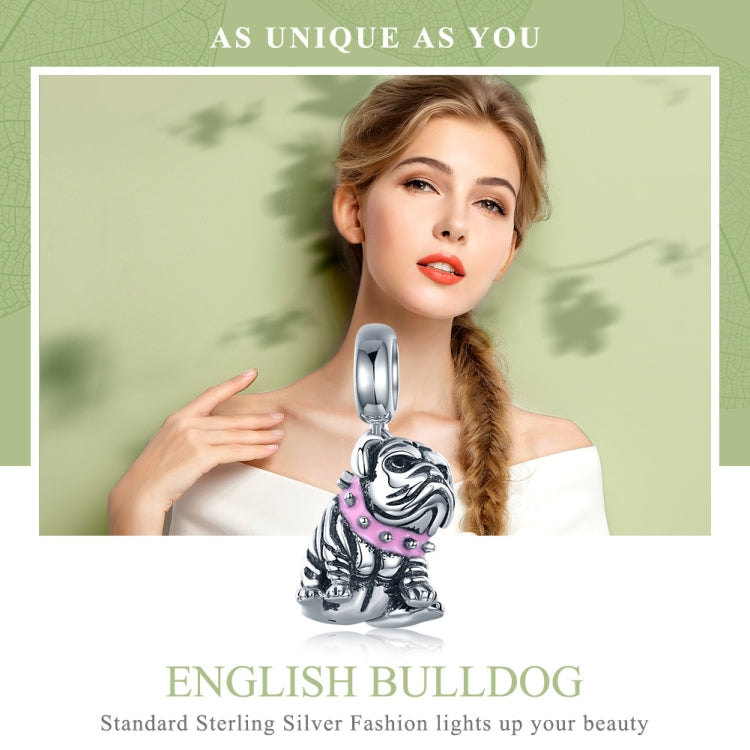 Sterling silver bulldog charm bead with pink enamel, shown on bracelet