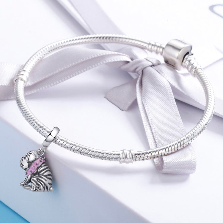 Sterling silver snake-chain bracelet with pink enamel bulldog charm and white bow