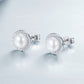 Pearl and diamond stud earrings in sterling silver