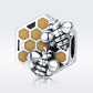 Sterling silver bee hive charm bead with yellow honeycomb enamel and bee motifs