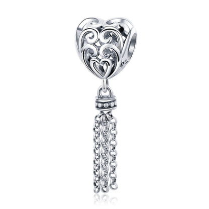 Heart-shaped sterling silver bead charm with swirling details and dangling chain tassel