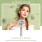 Heart-shaped silver charm bead with heart cutout and dangling chain tassel