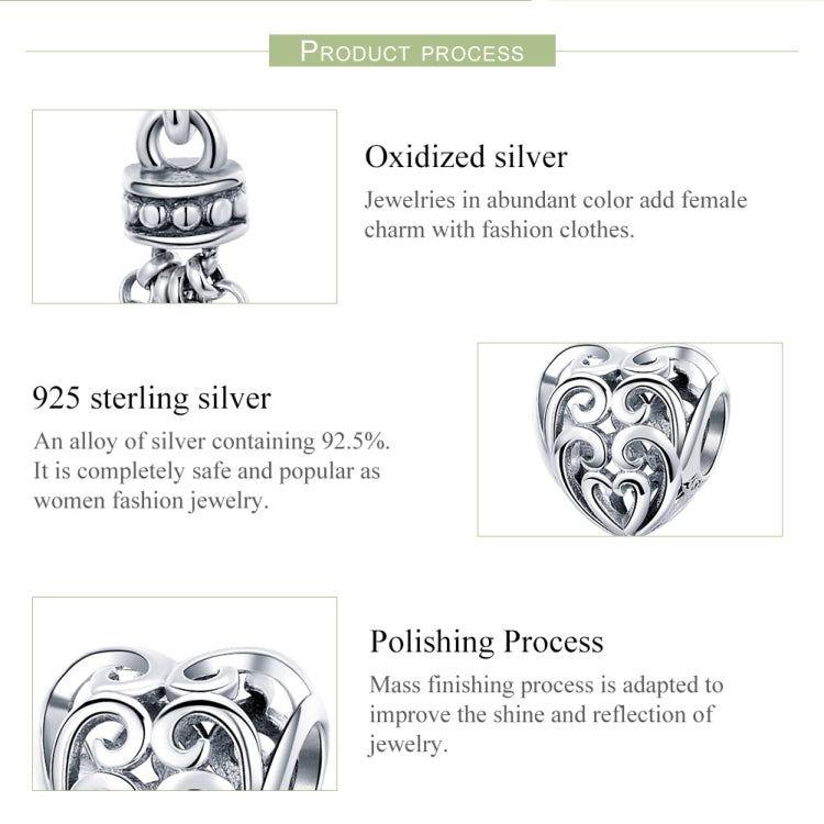 Heart-shaped sterling silver charm bead with swirling pattern and top loop