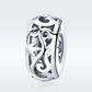 Close-up heart-shaped S925 silver charm bead with curly grass love pattern, high polish