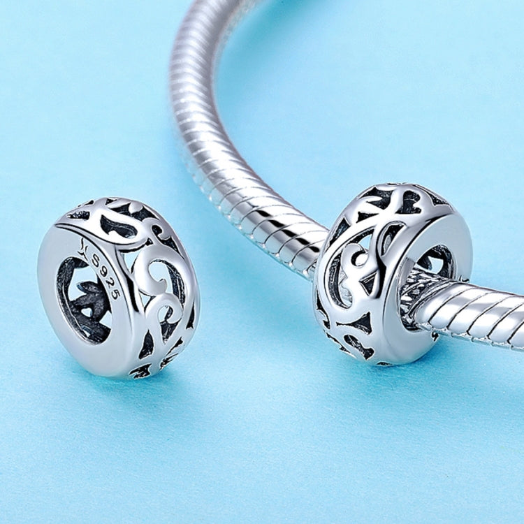 Pair of heart-shaped S925 silver charm beads with curly grass love pattern on bracelet