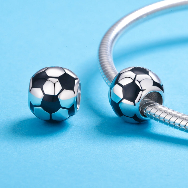 Soccer ball charm beads with black enamel on silver chain, showing two matching beads