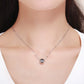 Silver necklace with soccer ball charm pendant featuring black enamel on a thin chain