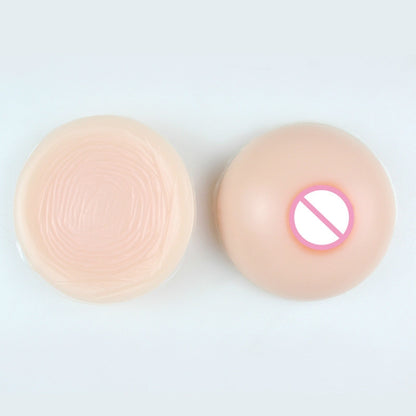 Round silicone breast inserts: textured face and areola nipple detail, 2-pack