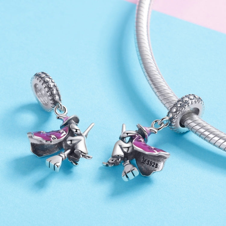 Sterling silver bracelet charms featuring a purple enamel witch broom on snake chain