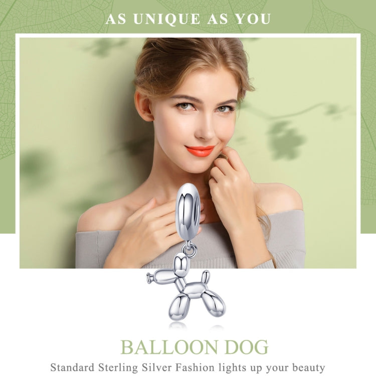 Balloon dog charm bead worn on a bracelet, shown centered