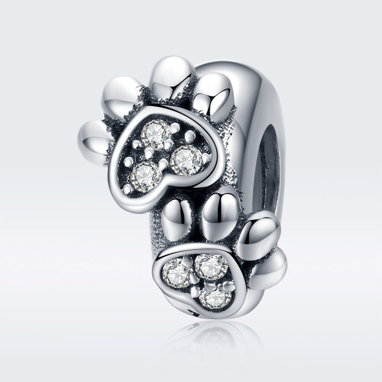 Sterling silver paw-print charm bead with CZ stones, oxidized silver finish