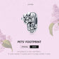 Sterling silver animal footprint charm bead with paw-print CZ stones, oxidized finish