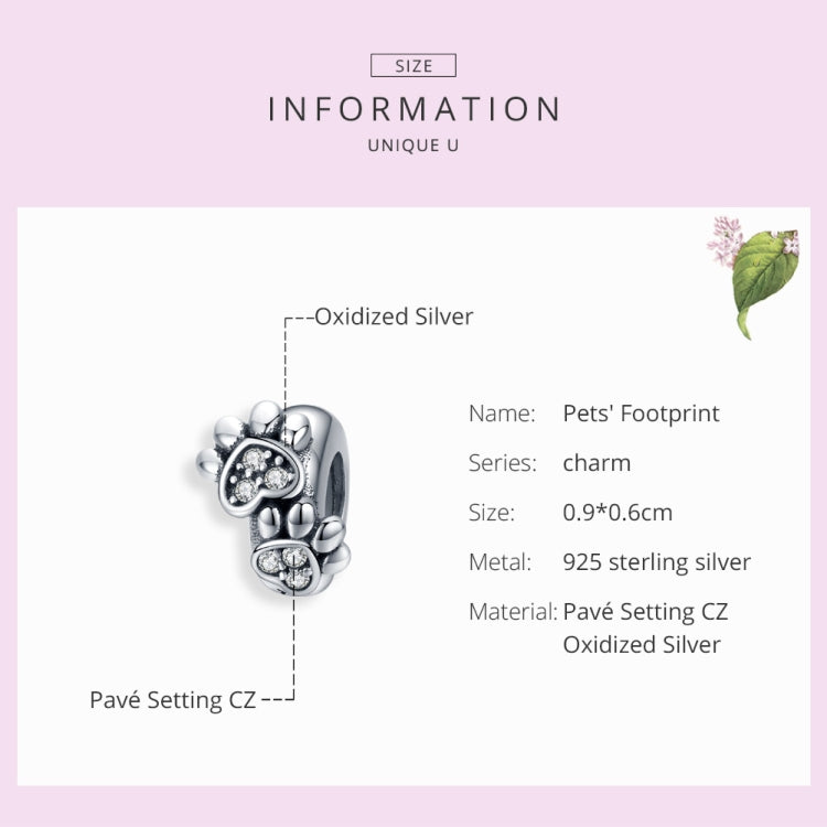 Sterling silver footprint charm bead with paw-print CZ stones, oxidized silver
