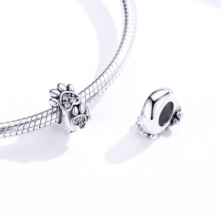Sterling silver footprint charm on a beaded snake chain with paw-print CZ stones