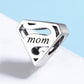 Sterling silver mom charm bead with heart-shaped cutouts, black enamel detail
