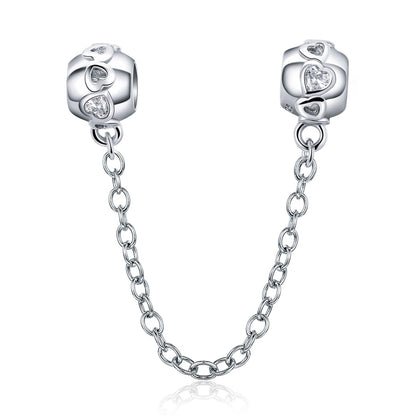 Sterling silver safety chain with two charm beads and round crystal accents