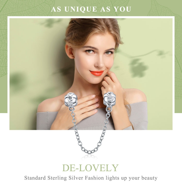 Sterling silver safety chain with two charm beads, round crystal details