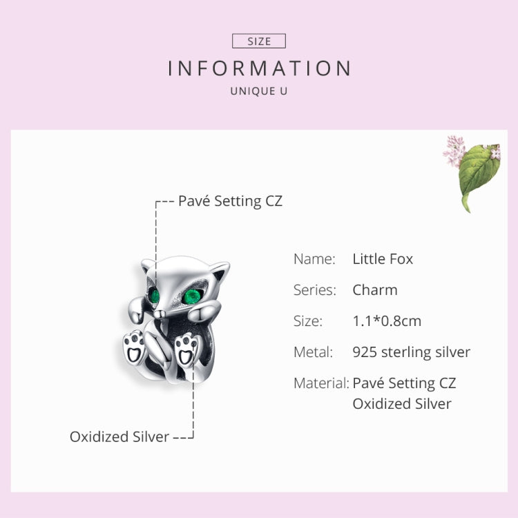Little fox charm bead in sterling silver with green eyes and paw print accents