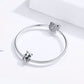 Sterling silver charm bracelet with snake chain, little fox bead, and heart charm