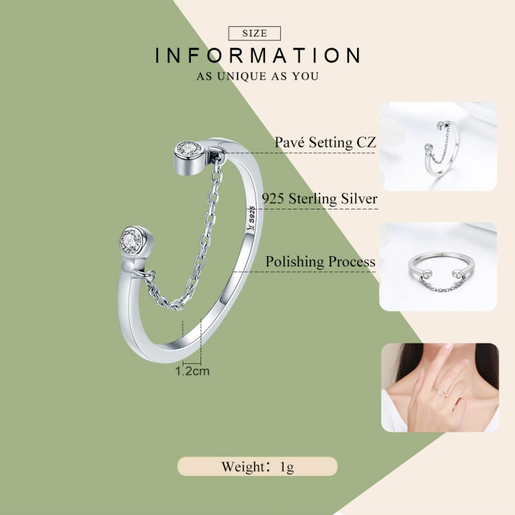 Sterling silver open ring bracelet with zircon accents and chain detail