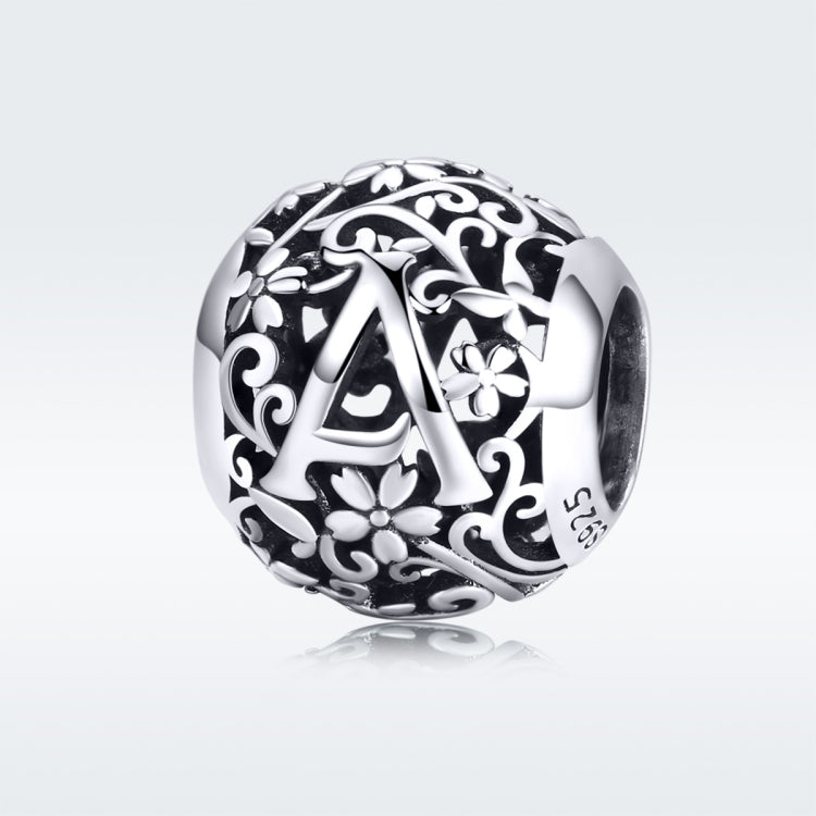 S925 sterling silver letter bead with black enamel pattern and floral motifs, side view