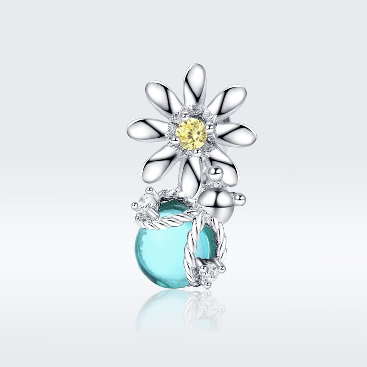 Sterling silver daisy charm bead with yellow crystal center and teal glass accent