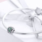 S925 sterling silver clover charm bead with green stones on braided bracelet cord