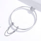 Silver snake-style chain bracelet with oval safety clasp and cat-themed charm end