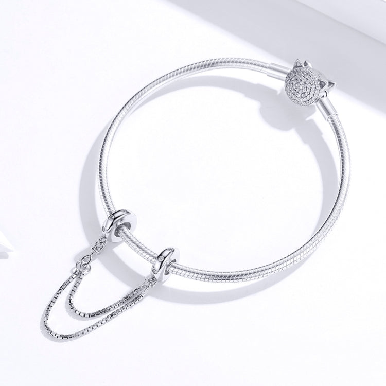 Silver snake-style chain bracelet with oval safety clasp and cat-themed charm end