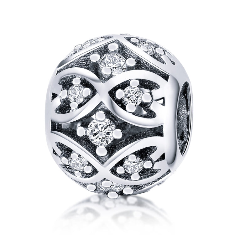 Sterling silver bead with black enamel filigree and sparkling crystal accents