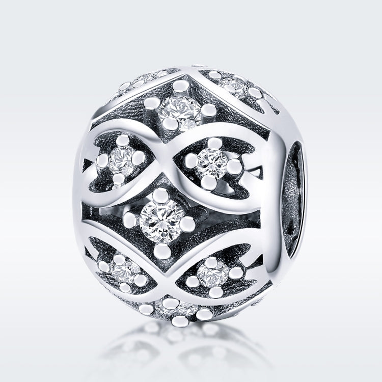 Sterling silver bead with black enamel floral and dotted crystal design