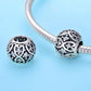 Sterling silver charm beads with black enamel and crystal stones on snake chain