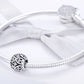 Sterling silver charm bead with black enamel and crystal stones on silver snake bracelet