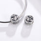 Oxidized silver rose charm beads on a linked bracelet strand
