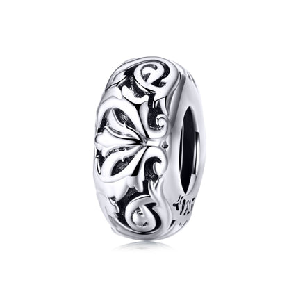 Sterling silver flower-pattern bead with oxidized swirl details, hollow design