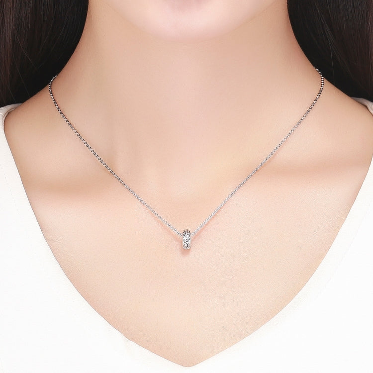 Sterling silver flower-pattern bead pendant on a fine chain necklace