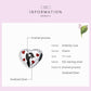 Heart-shaped charm with black silhouette and red heart enamel details on oxidized silver