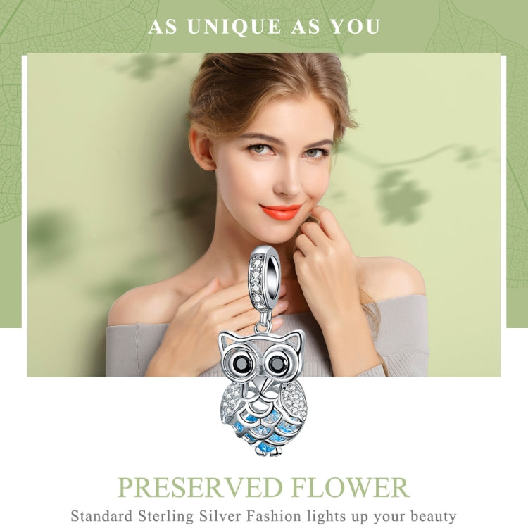 Owl charm pendant in sterling silver with blue enamel scallops and clear rhinestones