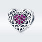 Sterling silver heart-shaped bead with pink stone pattern