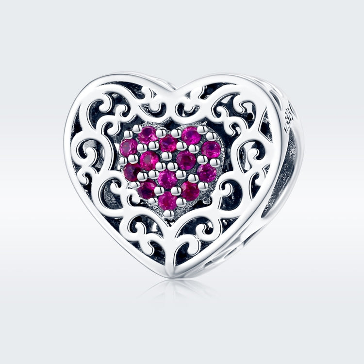 Sterling silver heart-shaped bead with pink stone pattern