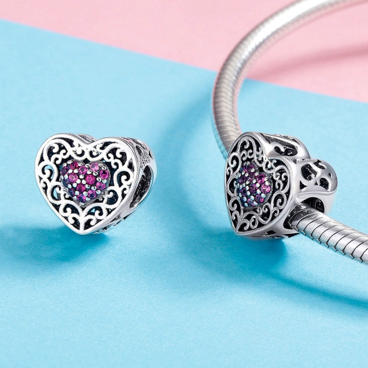S925 sterling silver heart-shaped charm bead with pink crystal center