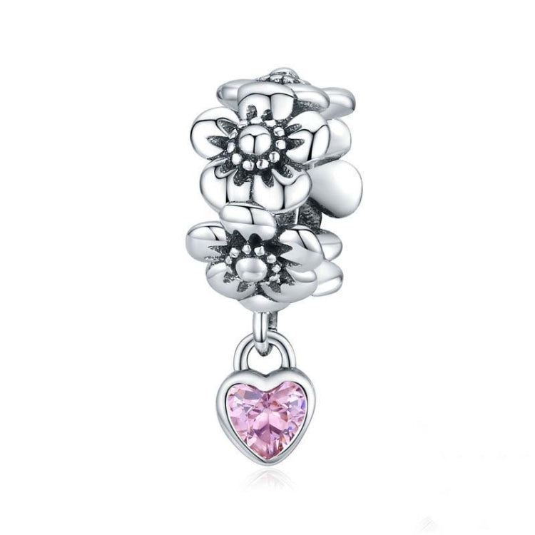Oxidized silver flower charm bead with pink heart-shaped gemstone drop