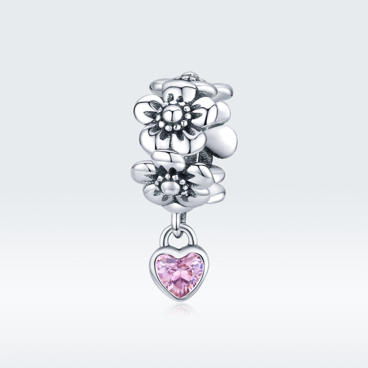 Sterling silver flower charm with hanging pink heart CZ pendant