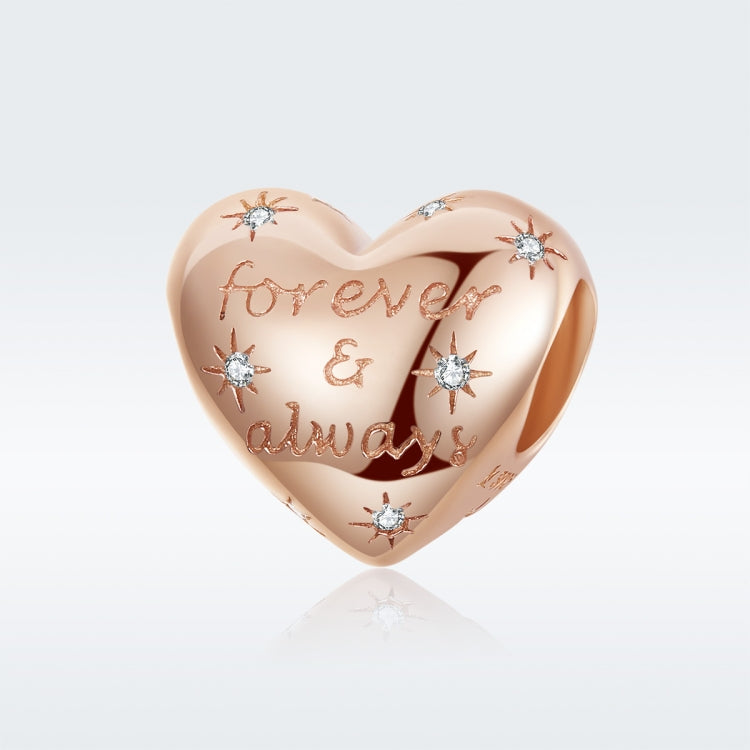 Rose gold heart charm bead showing 'Forever & always' script with CZ star accents