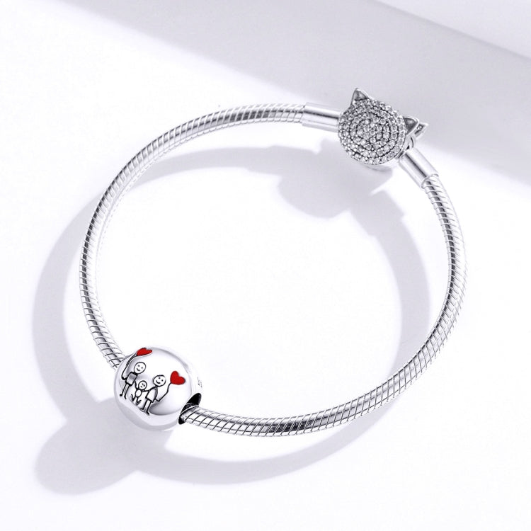 Snake-chain bracelet with round family charm bead and sparkling rhinestone clasp