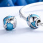 Sterling silver globe bead with blue enamel and clear stones on bracelet